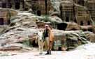 Man with his mule in front of tombs.  Petra, Jordan